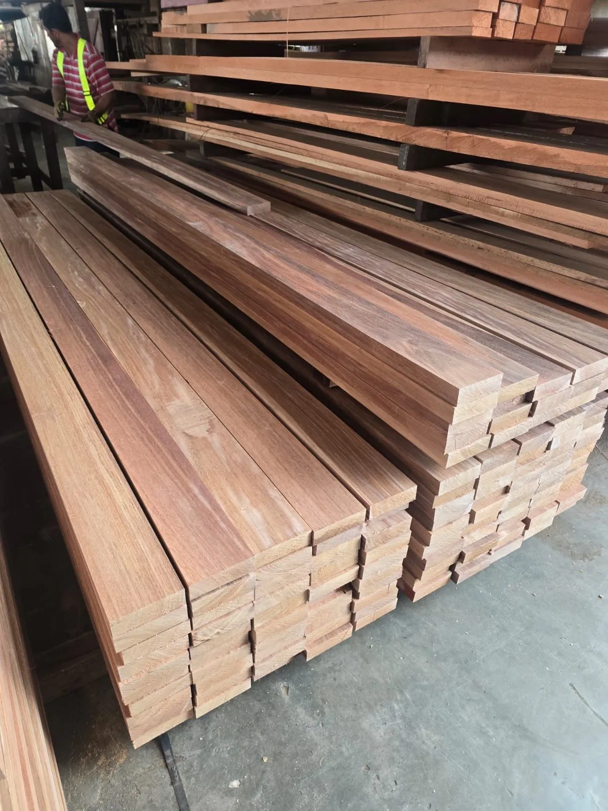 Hardwood stock being prepared and checked in a workshop